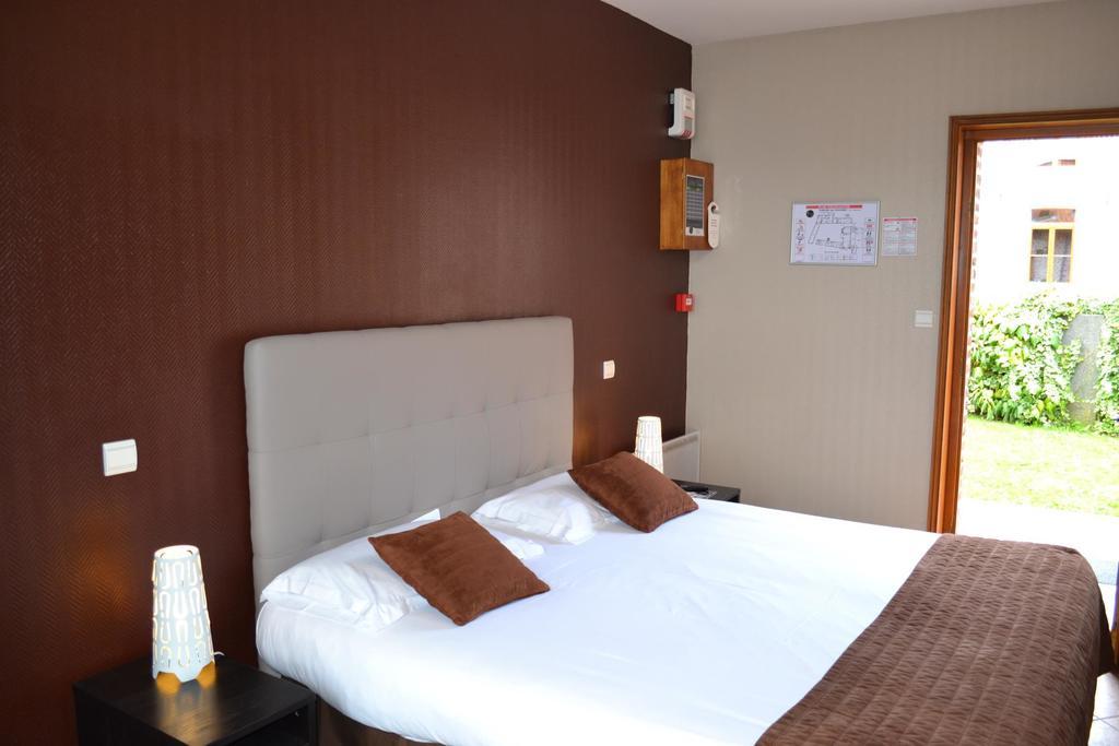 Le Domaine Des Cigognes Hotel Ennevelin Kamer foto